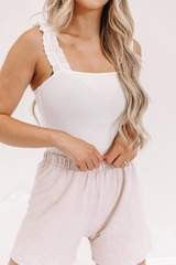 White Ruffle Ribbed Bodysuit | Lane 201 Boutique