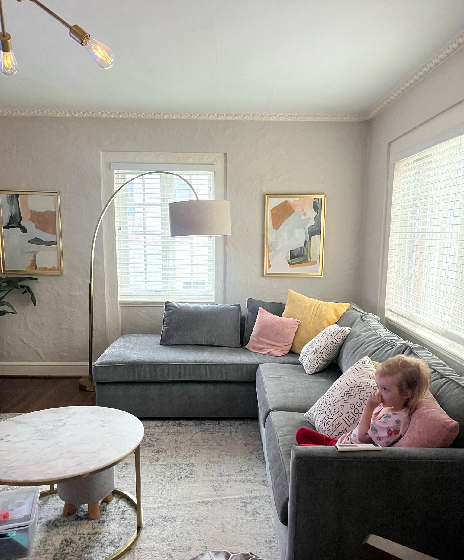 Living room favorites. Recently got a few new pillows and art to pull it all together!

We looooove the sectional from West Elm! (We have the Harris Sleeper Sofa with a Bumper Chase in distressed peuter velvet)

#LTKhome