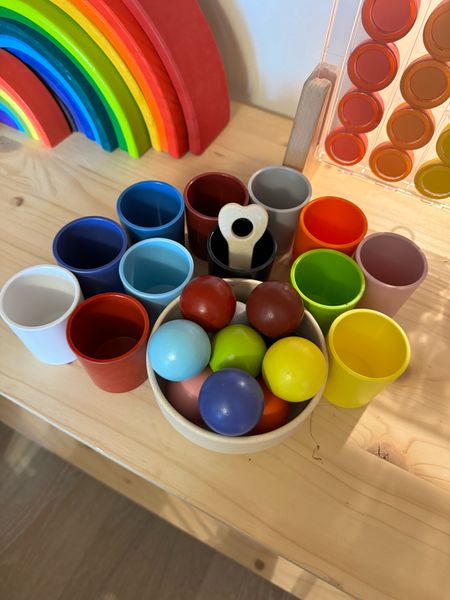 Montessori toy. Rainbow balls. Sorting. Cups. Balls sorting colors  