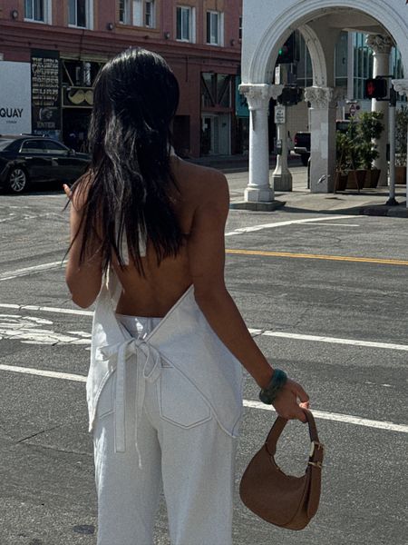 lioness white halter top size 2 & white denim jeans size 2, status anxiety brown sunglasses, miy Miy brown bag, summer outfit, summer style, summer fashion

#LTKeurope #LTKstyletip #LTKparties