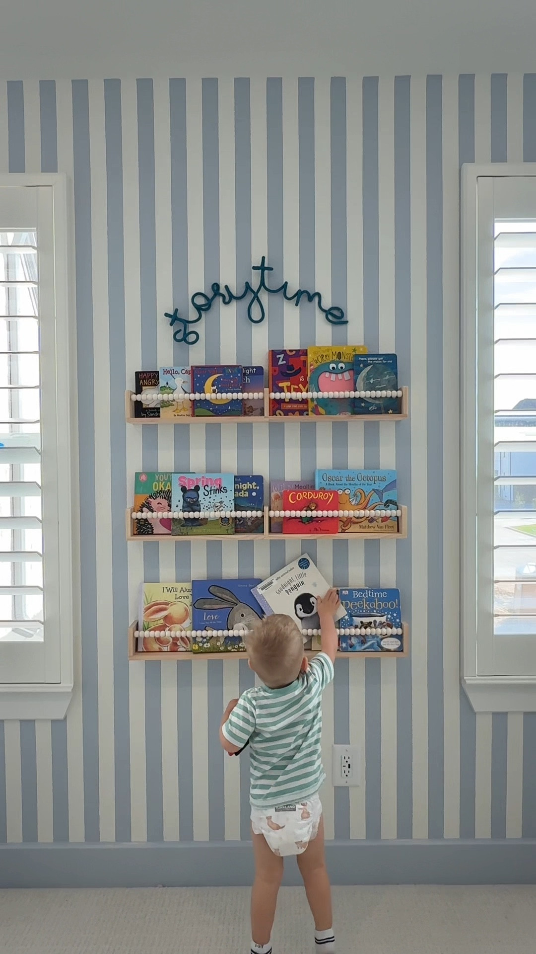I’m obsessed with how this turned out! All from Amazon - very affordable and instantly transformed this space! *** UPDATE  — the blue storytime sign is from this Amazon  seller I have linked first  but it’s now sold out in blue which is why the rainbow color is showing up instead. I’m linking some other sellers that sell custom names signs that you could order from and ask them to make it this same way if you like! 😘🩵

#LTKstorytime #LTKHome #LTKmomlife