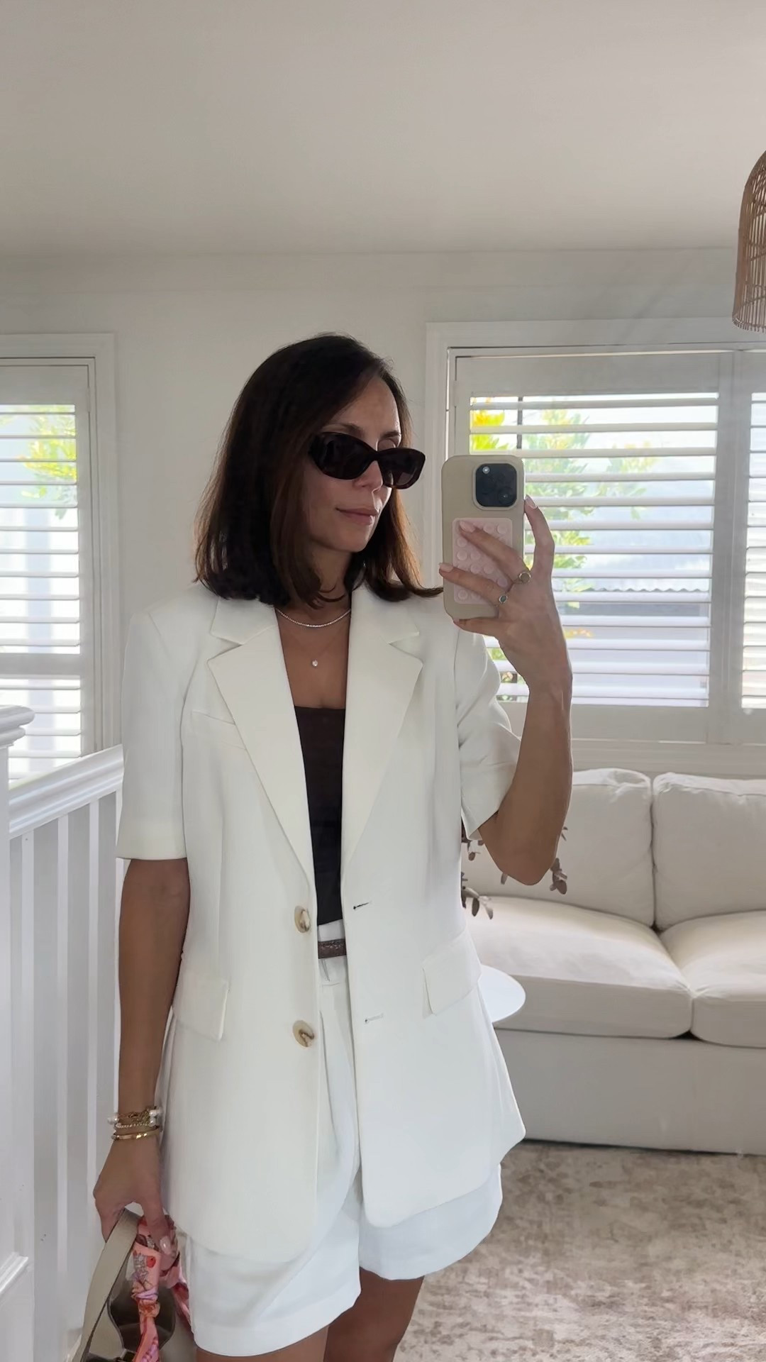 A cute little white summer suit with a short sleeve blazer and tailored shorts 

#LTKsummer #LTKaustralia