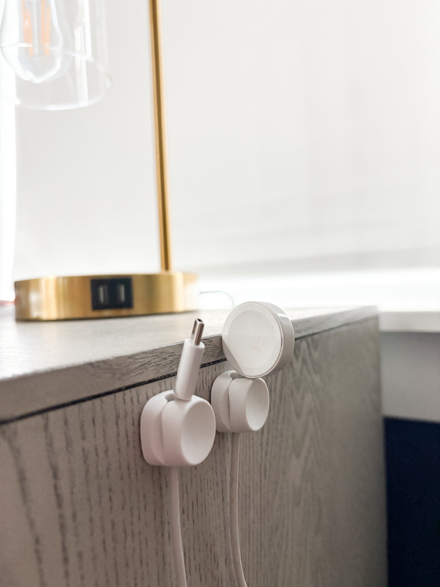 Love these cord organizers so your cords don’t fall on the ground or you don’t have to reach far to grab your chargers! I have them on my nightstand and they’re also great at your desk!

my exact lamps are no longer sold but I linked super similar!

| home organization | cord organizers 

#LTKHome