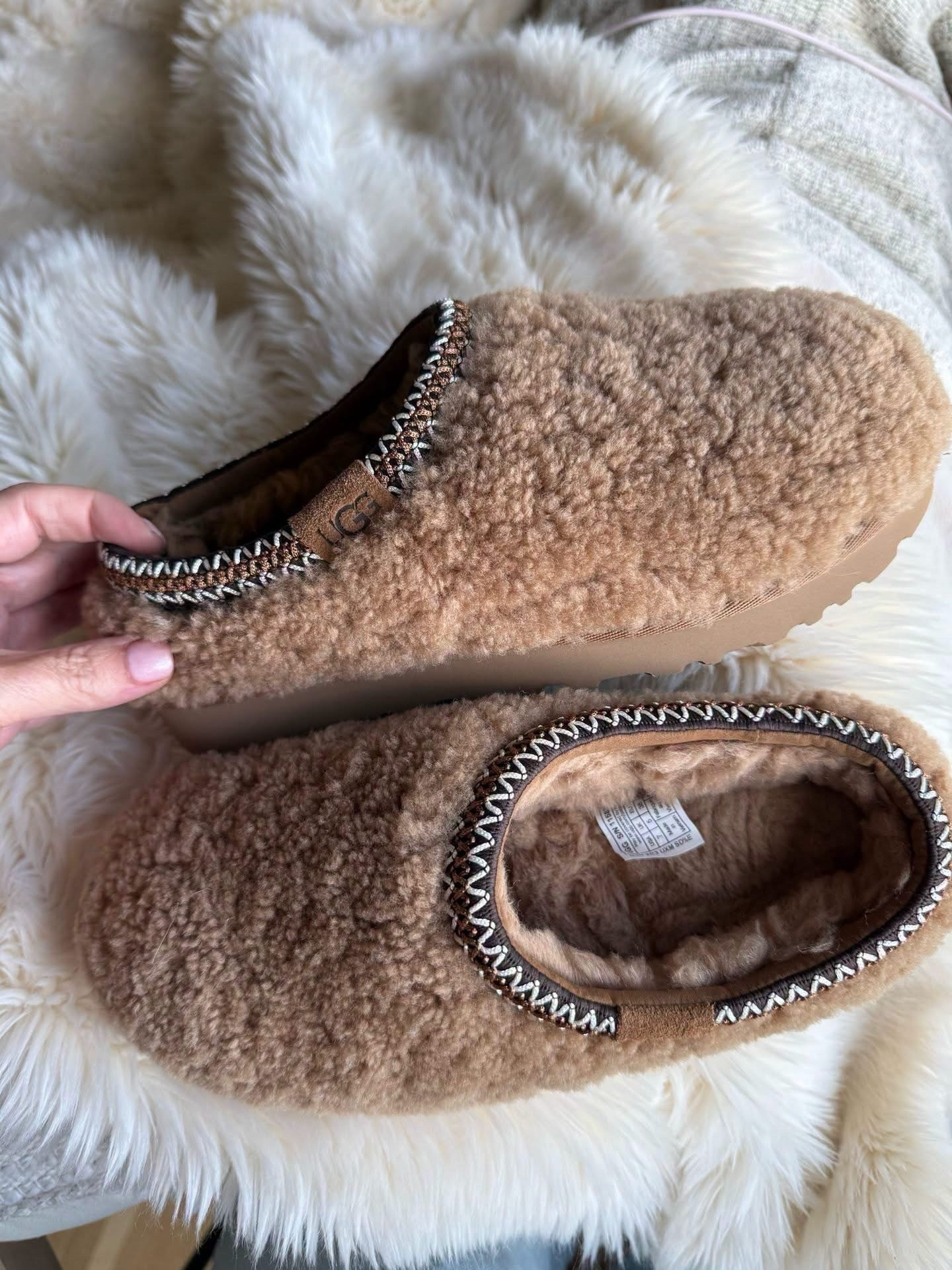 My UGG Tasman curlys are ON SALE! 

Selling fast! I did size up one size to a 7. 

Dropping 🔗👇 to shop

#LTKootd #LTKSaleAlert #LTKSeasonal