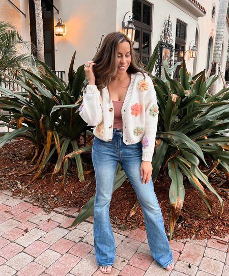 Spring Outfit 🌸 I’m obsessed with this floral knit cardigan paired with these flare jeans! 
I’m wearing a S/M in the cardigan and 26 in the jeans 

#LTKunder100 #LTKstyletip #LTKfit