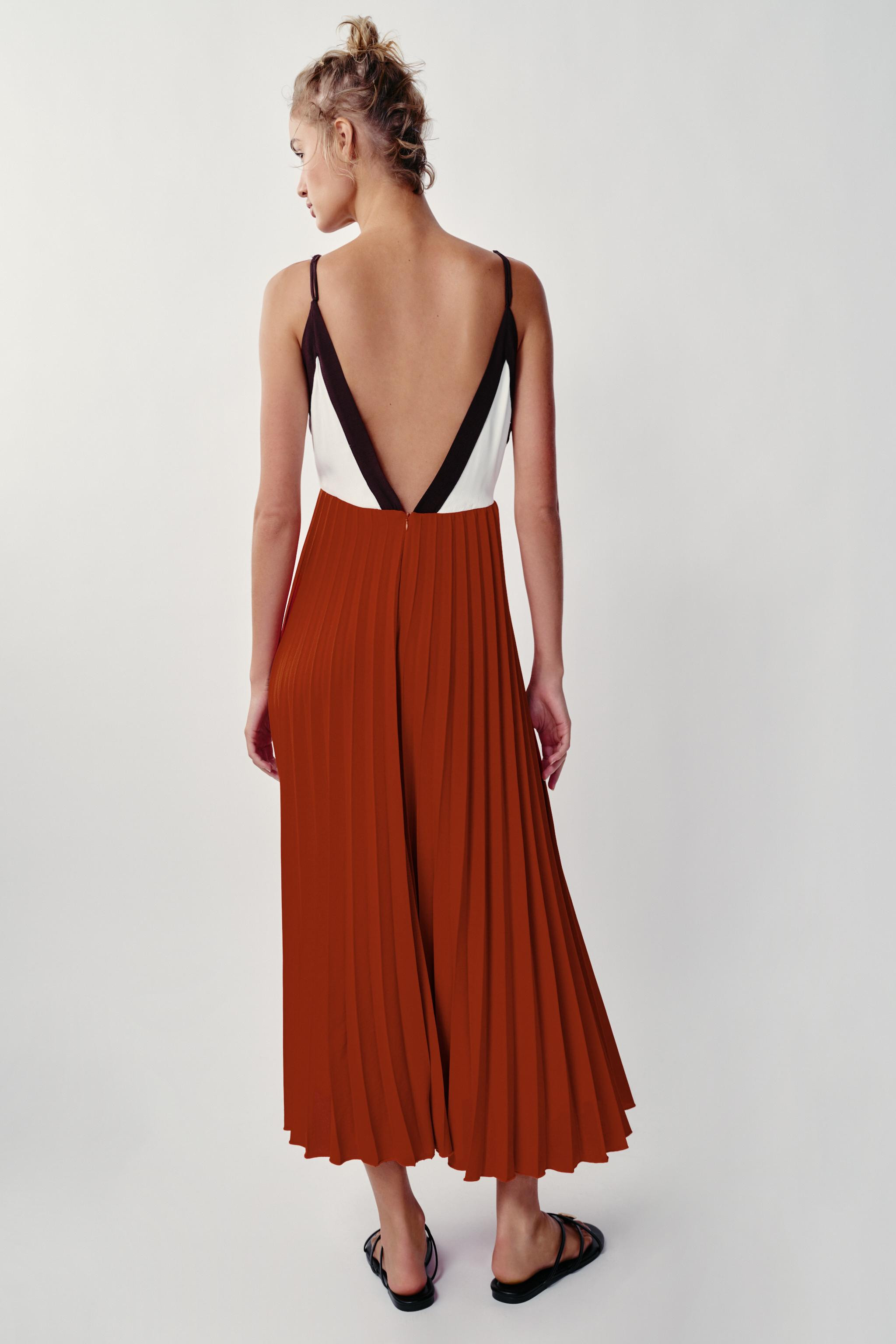 V-neck dress with spaghetti straps and beaded detail. Back closure with concealed in-seam zipper. | Zara US
