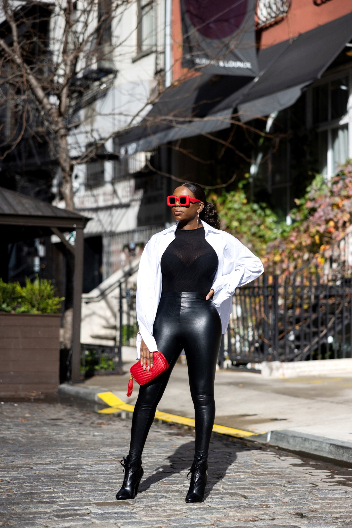Black and White Monochromatic look with a pop of red.

#LTKfit #LTKHoliday #LTKstyletip
