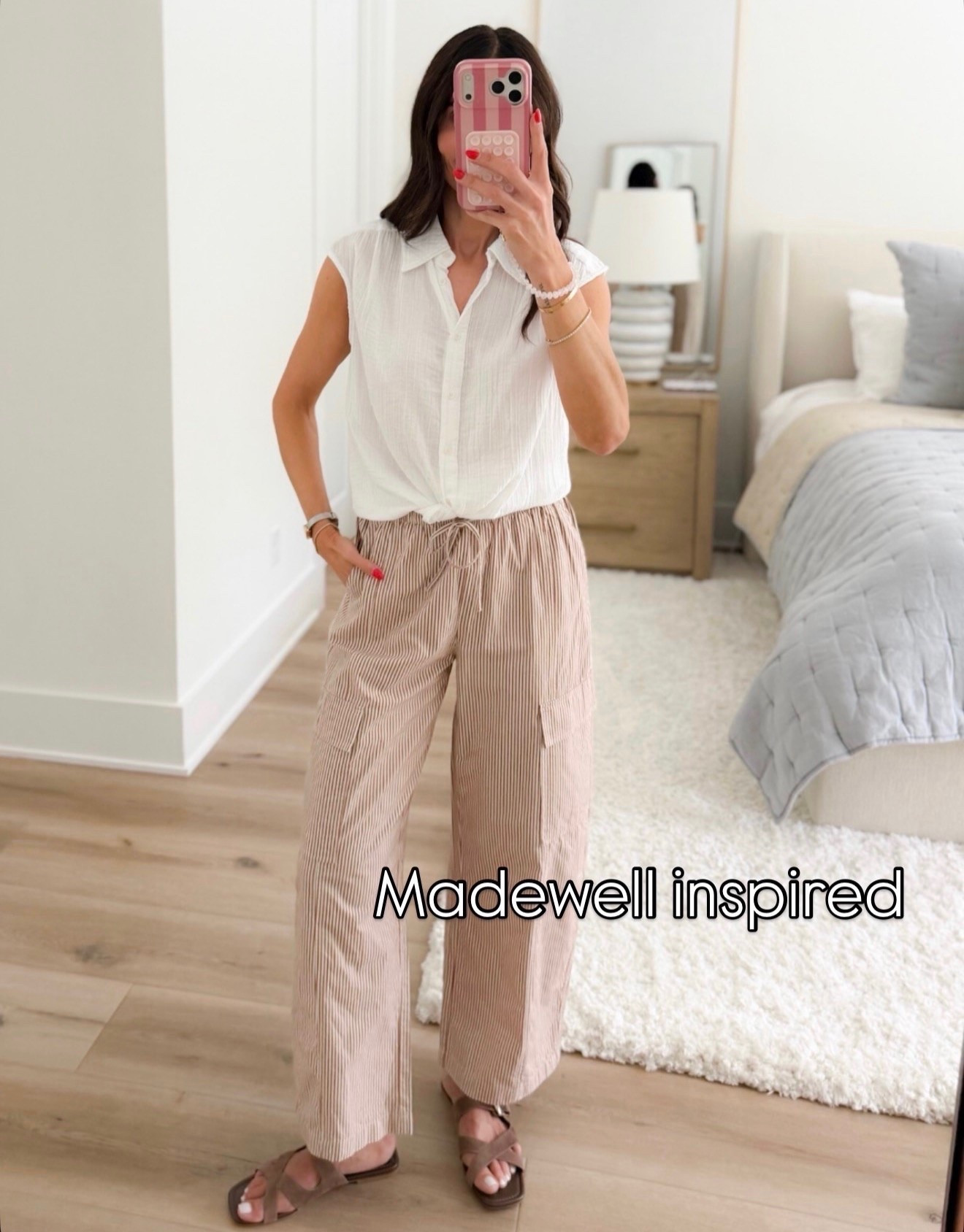 These striped cargo pants have that relaxed Madewell inspired feel without being too oversized. The drawstring waist keeps them comfortable, while the straight leg and subtle stripe make them easy to style with a simple white top and sandals now, then a lightweight sweater later.

Size XS

striped cargo pants, Madewell inspired, casual pants, drawstring pants, wide leg pants, summer to fall outfit, transitional style, everyday outfit, neutral pants, casual fashion, annabrstyle

#LTKootd #LTKSeasonal #LTKOver40