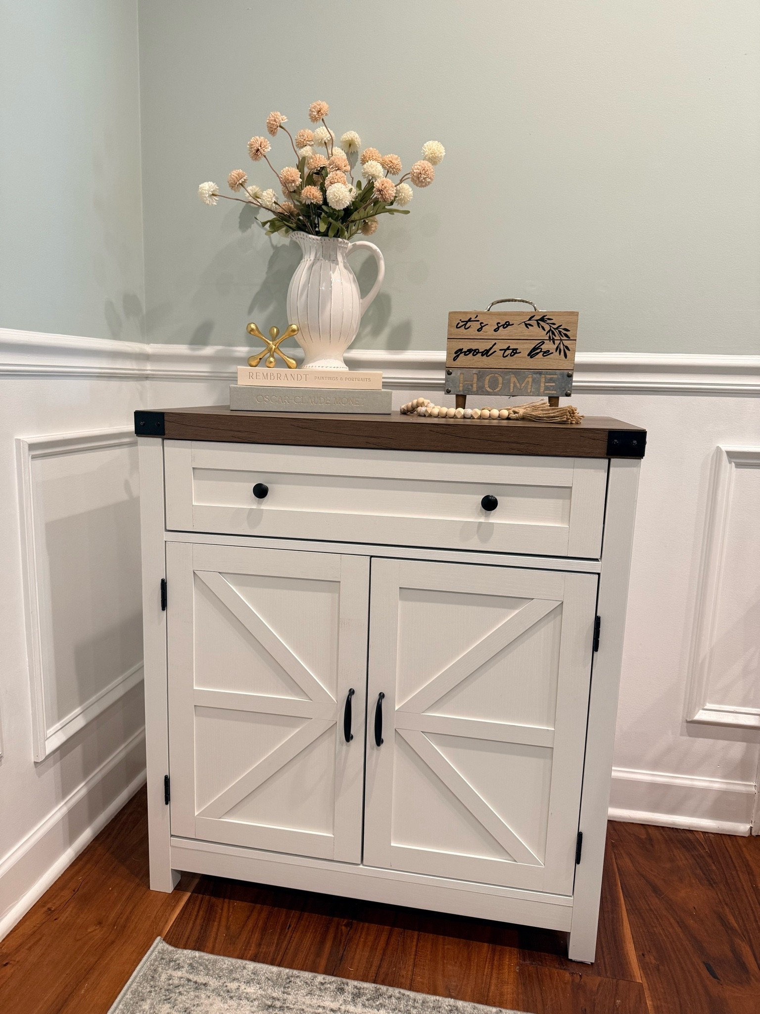 Styling dining room cabinet with these gorgeous faux silk mums in a white pitcher. 
Those are faux books with hidden storage as well.

The cabinet is from Wayfair! Farmhouse style looks inspo for home

#LTKdayinmylife #LTKHome #LTKSaleAlert