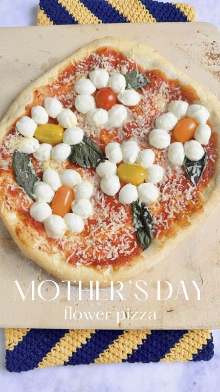 🍕Surprise Mom with a Floral Pizza Creation this Mother's Day! 🌺 

Looking for a delightful way to show the special women in your life how much you appreciate them this Mother's Day? Why not treat them to a uniquely fun and delicious flower pizza creation straight from the heart? Here's how to whip up this adorable culinary masterpiece:

Start by cooking your pizza dough according to the instructions, ensuring it's perfectly golden and crisp. With just a couple of minutes left on the dough, remove it from the oven and begin adding your toppings, creating mini flowers. Place mini mozzarella cheese balls cut in half onto the dough, surrounding cherry tomatoes,  arranging them in a circular pattern to resemble the petals of a flower. Add fresh basil leaves, mimicking the lush greenery of a garden, and generously dust Parmesan cheese to top it all off. Finally, place it back in the oven for a final few minutes until the cheese is just beginning to melt, allowing the flavors to melt together beautifully.

Whether you're celebrating your mom, grandmother, aunt, or any special woman in your life, this pizza is sure to bring a smile to their face and warmth to their heart. 🌸🍕

Cute DIY Gift Ideas | Thank you For Your Love | What I Bring To The Table | Cheap Mothers Day Gifts | DIY Stuff to Make | Last Minute Gift Ideas | Unique Mothers Day Gift | Easy Things to Make at Home | Easy Food Recipes on TikTok | Cute Food | Dinner Food | Food Aesthetics | Making Food
Mothers Day | Easy Recipes | Home Made Pizza | pizza lover | Gifts for Mom | Gifts for Her | Pizza Time | Unique Gifts | Food Recipe 

#LTKparties #LTKVideo #LTKfamily