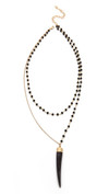 Click for more info about Bone Tusk Necklace