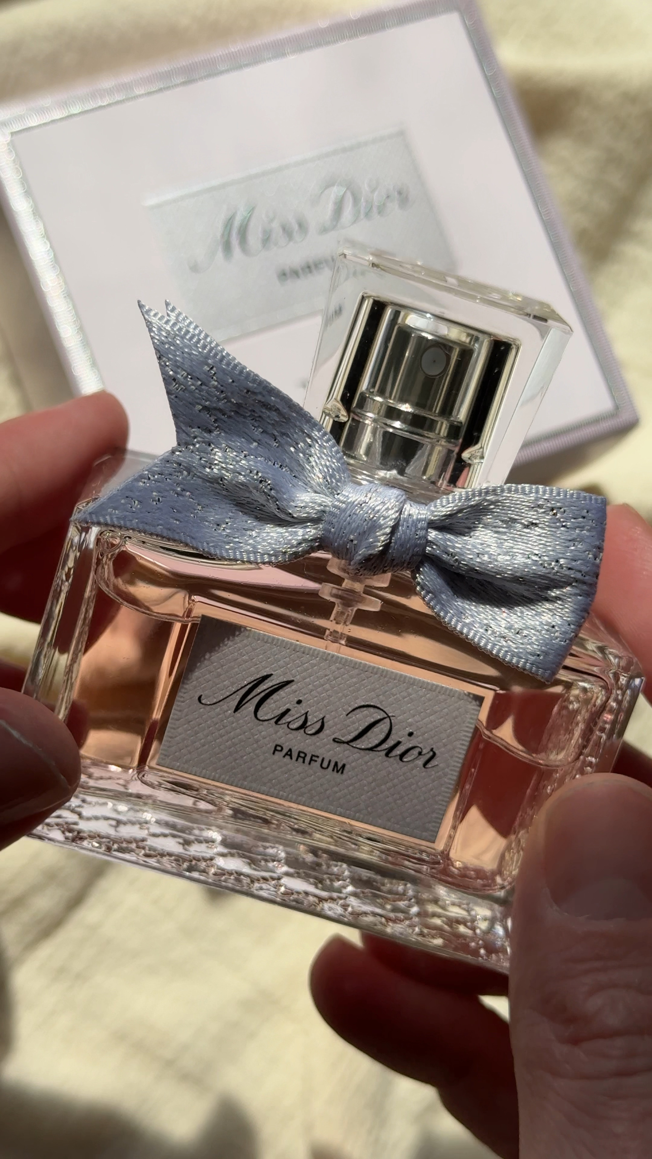A new spin on the original Miss Dior Perfume, this one has lovely notes of mandarin, jasmine, patchouli, and cedar. The bottle is absolutely GORGEOUS!! A lovely addition to any perfume lovers collection!!