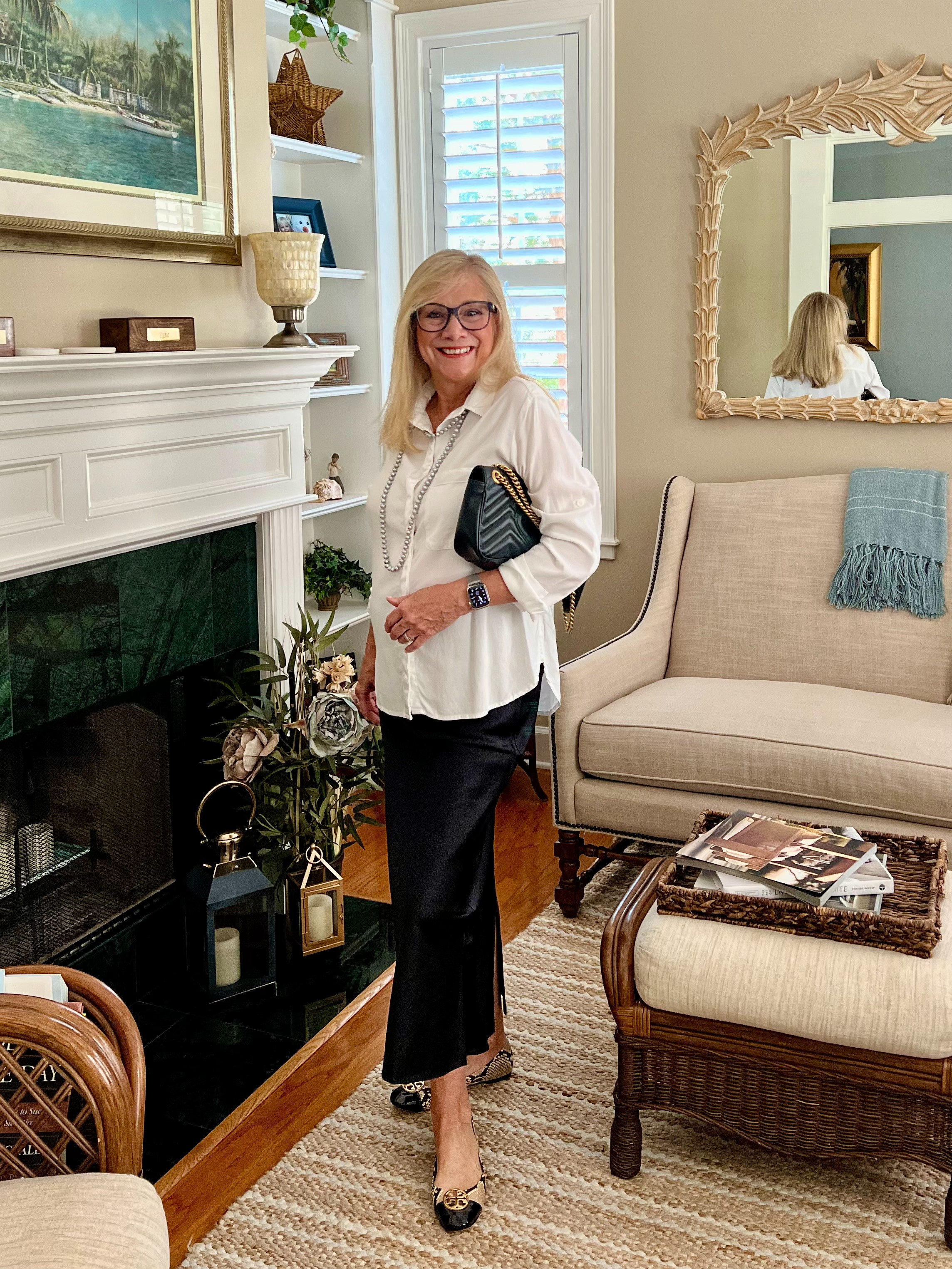 Classic, comfortable, and on sale! My favorite combination. This polished black-and-white look has been on repeat for dinner out and casual events all season long. The crisp white button-down, easy black skirt, timeless flats, and quilted bag are pieces that truly work hard in my wardrobe. Even better, these staples are currently on sale, making it the perfect time to scoop them up. Timeless style that you'll reach for year after year. Link here for easy shopping. 

 #LTKValentine #LTKSaleAlert #LTKMidsize