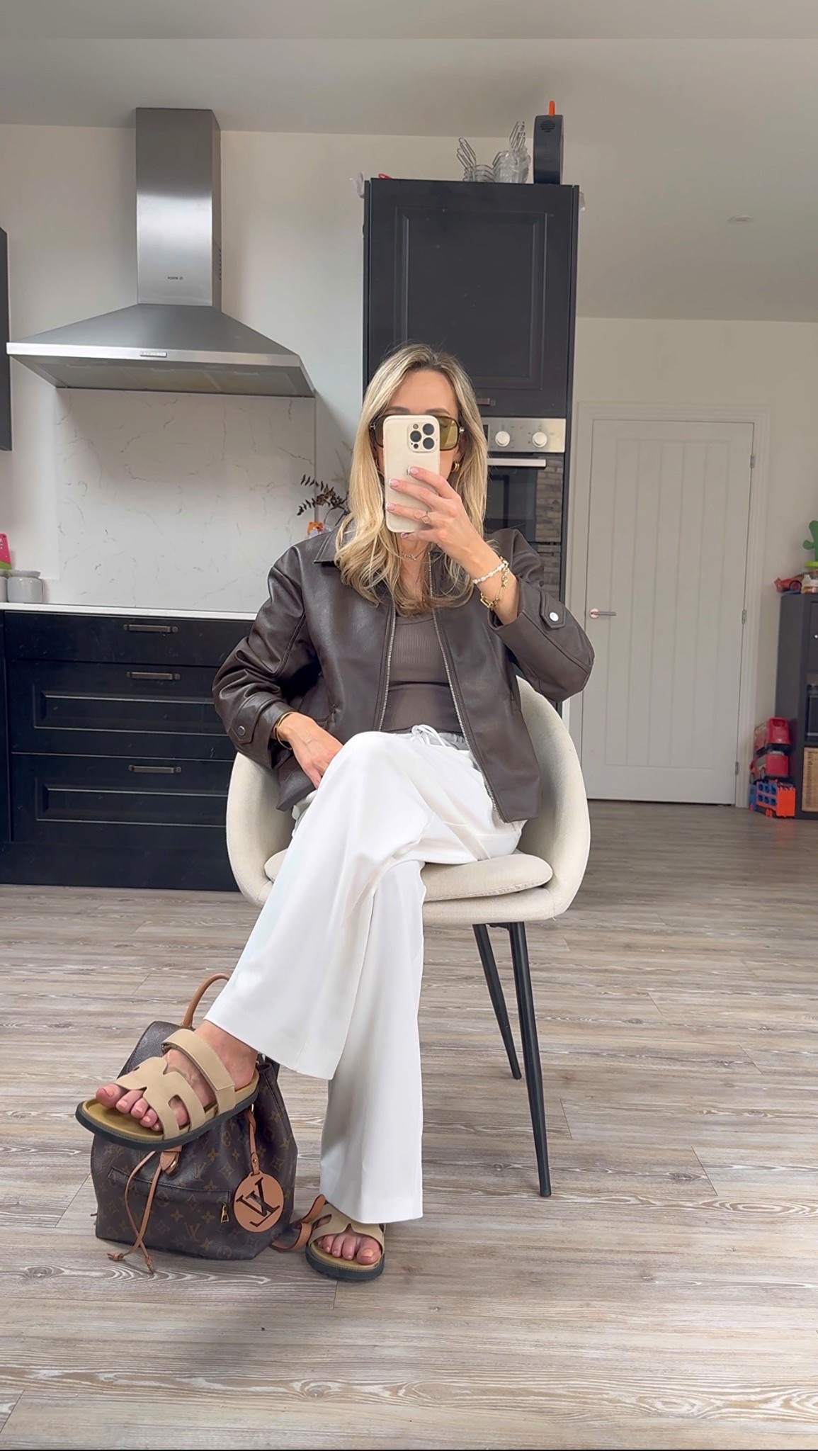 An everyday spring summer outfit styling white trousers and a brown faux, faux leather, jacket 



#LTKspring #LTKstyletip #LTKuk