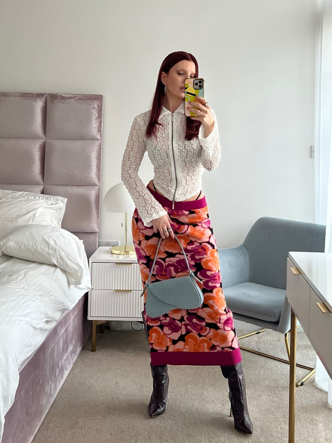 Styling a knitted midi skirt for autumn/ winter ❄️ 

. 

💗 Style tip:  Lately, I’m all about clashing colours, prints, and textures—basically pairing things that shouldn’t work but do. Think Miu Miu, Gucci and Prada.

For this look, I’ve styled a white lace shirt with a pink-and-orange floral knit midi skirt, brown croc knee-high boots and a denim bag for that grandma-chic vibe. Obvs, I had to add some edge: the skirt sits low-waist to show a peek of my knickers, and I cinched the shirt at the waist with a DIY hack using a hairband. Slightly chaotic but it works...

. 

💗 Save this look for later

#winterfashion #autumnoutfitinspo #festiveoutfit #outfitinspo #winteroutfit




#LTKwinter #LTKuk #LTKstyletip