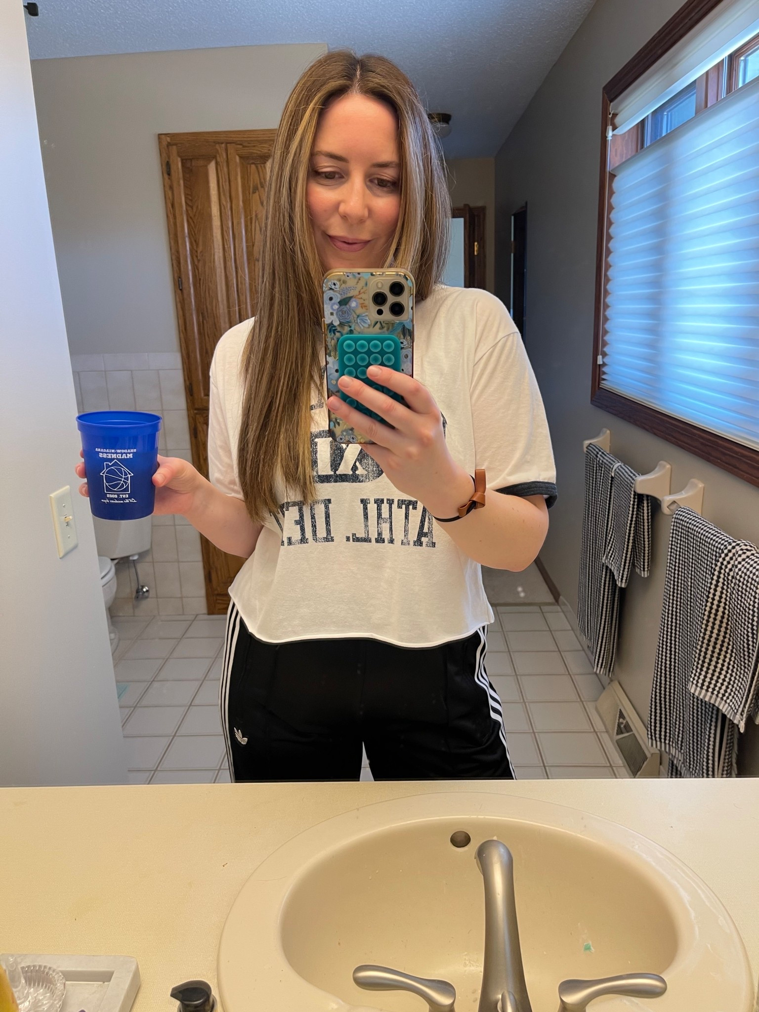 Final Four party 🏀 I love this time of year! We hosted friends from our neighborhood March Madness pool to watch the Final Four games. I made sliders, meatballs, created custom cups for the event, and added some basketball-inspired details like festive party picks, clementines, and orange plates, napkins, flowers, and drinks. I love a theme! Chris also surprised me with basketball cupcakes from a local bakery for my birthday. Feeling grateful to have this crew to celebrate with! 

#LTKParties #LTKSeasonal