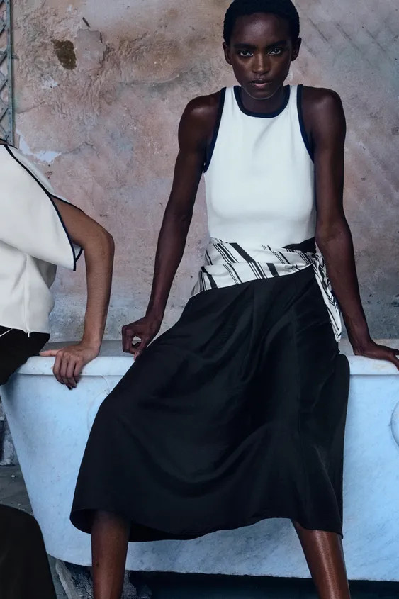 Round neck sleeveless dress. Features contrasting fabric detail and a knotted scarf at the waist.... | Zara US