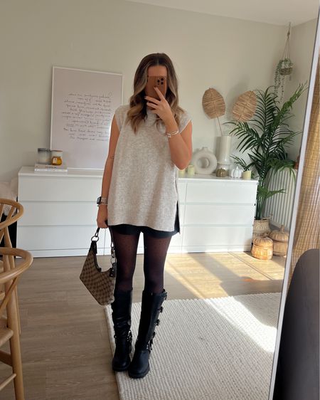 Ways to style biker boots - H&M knitted vest with leather shorts and 40 denier tights for a classic everyday autumn look 

#LTKshoecrush #LTKfindsunder50 #LTKeurope
