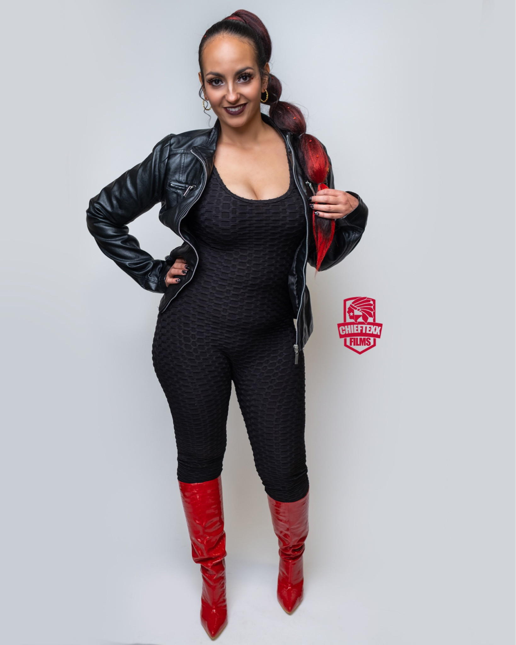 Black Jumpsuit, Red Knee high Boots, Black Faux leather Jacket #blackandredoutfit 

#LTKshoecrush #LTKfit