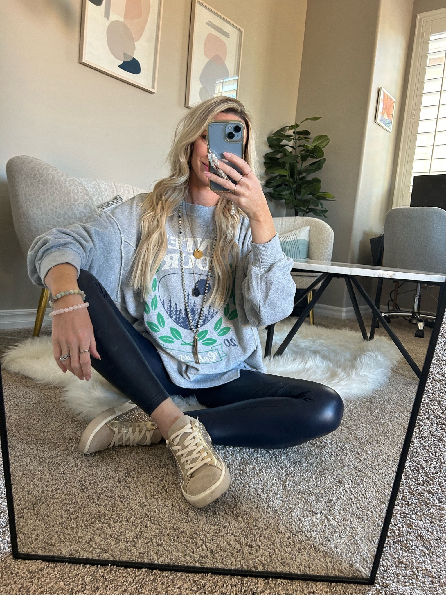 You cant go wrong with shiny leggings and an oversized sweatshirt right?! The leggings and sweatshirt are on major sale! 

#LTKstyletip #LTKfindsunder100 #LTKMostLoved