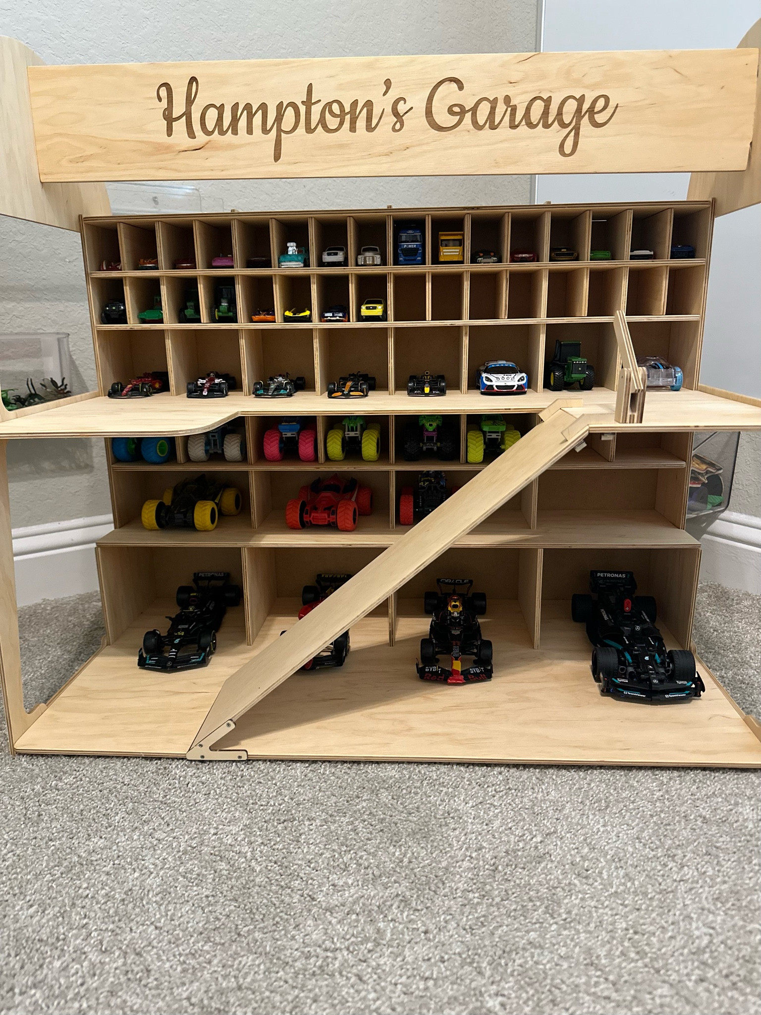 Toy car garage! 

With or without a custom name 

#LTKHoliday #LTKKids #LTKGiftGuide