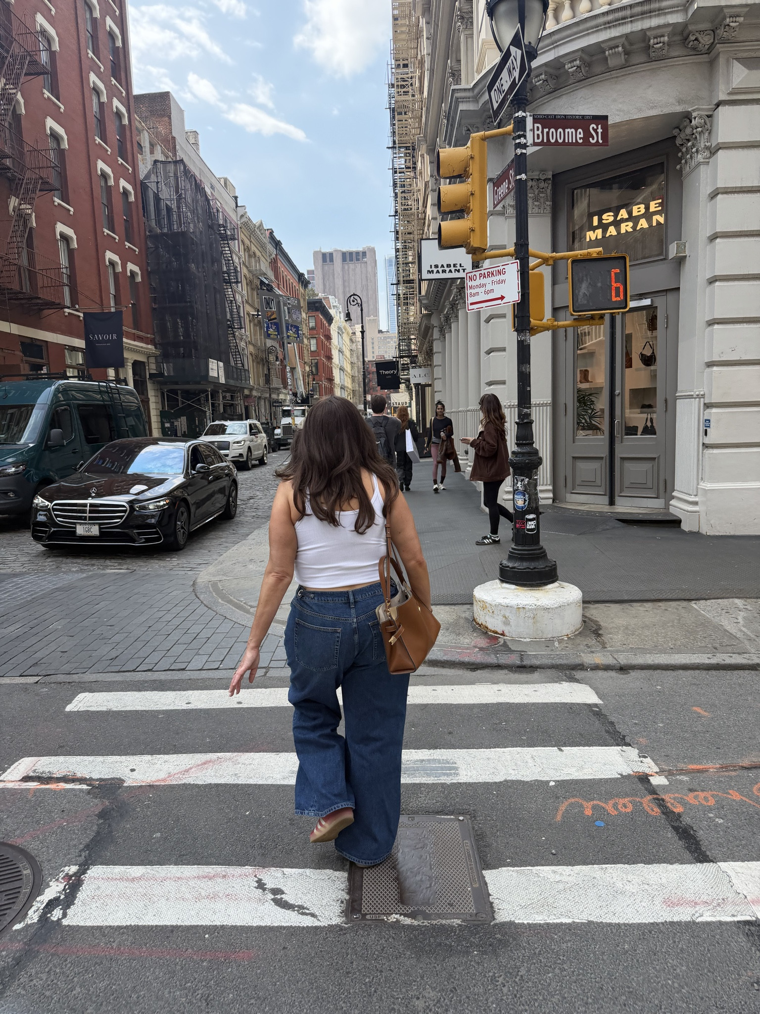 Jeans run large. May be able
To size down (even though they are adjustable) unless you plan on wearing them very low and loose. 

This tank has gotten me through everything and it’s so affordable. I wear my everyday bra with it and if the straps show - oh well. 

Bag was a bag I’ve coveted for a while and finally ordered. It sold out quickly and is back for pre orders. 

#LTKMidsize #LTKPetite #LTKootd