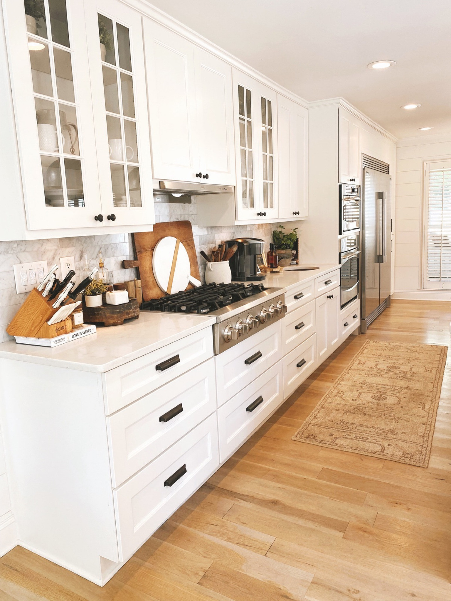 Kitchen inspo, modern classic kitchen, cutting boards, cheese boards, kitchen decor, backsplash, runner rug

#LTKSeasonal #LTKhome #LTKstyletip