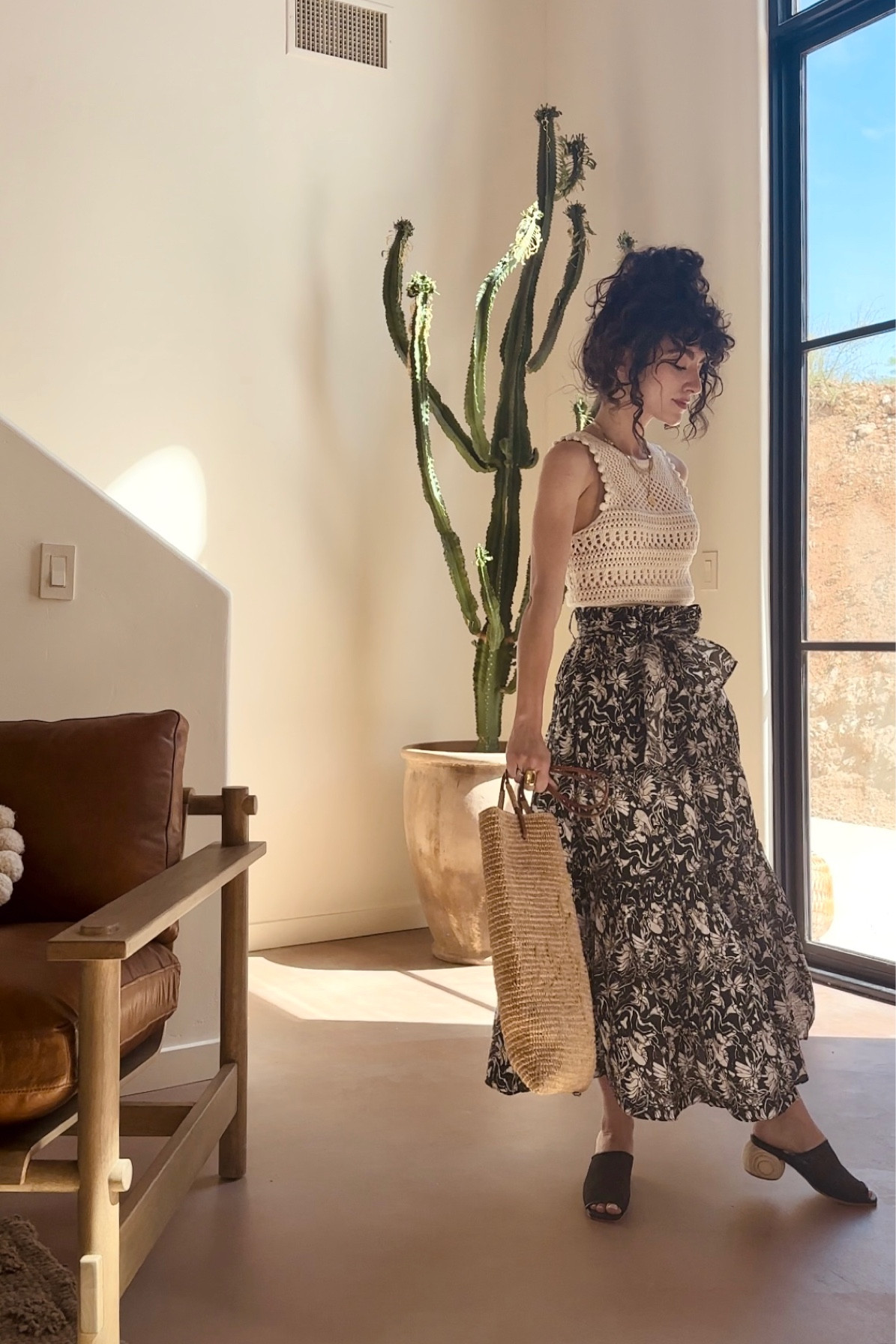 Floral skirt and white crochet tank - spring summer outfit ideas - black mule slides 

#LTKSeasonal #LTKstyletip