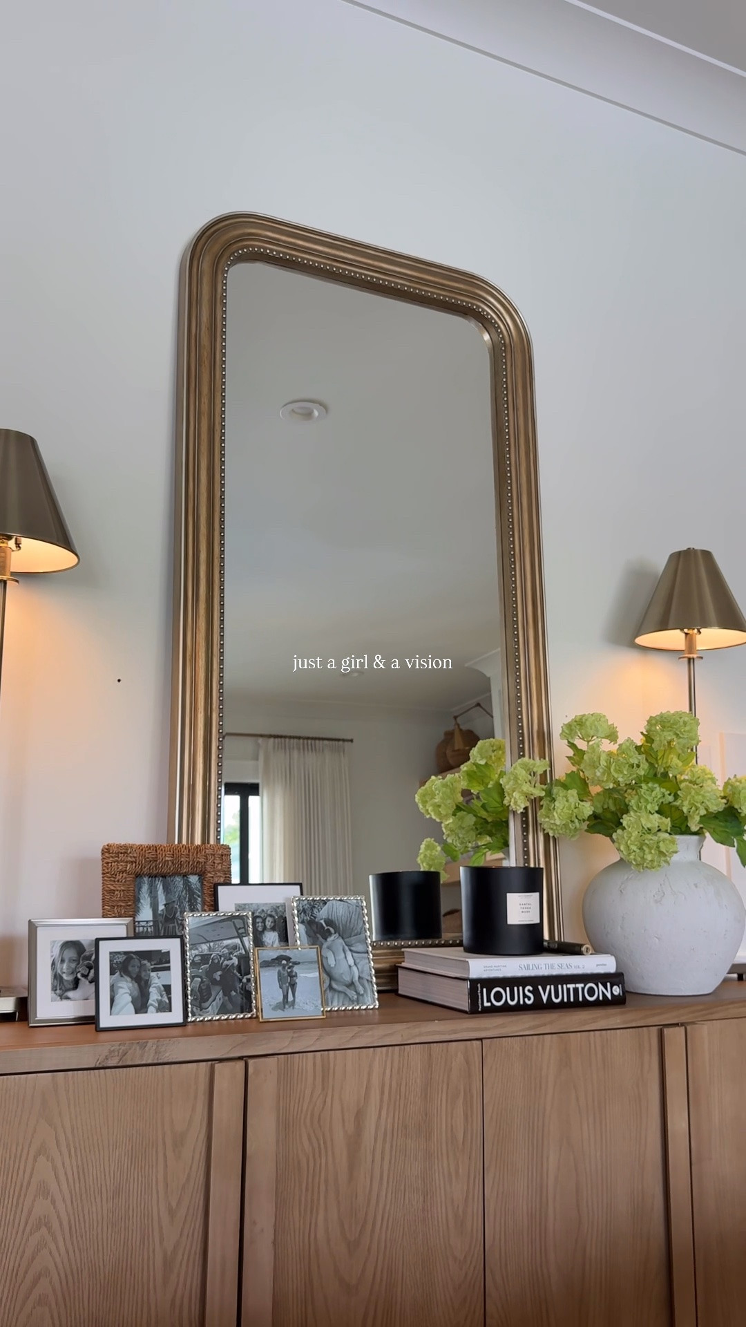 so excited for how this cabinet turned out, the mirror really is that girl! 🤏🏼 | cabinet + theeeee best candle are both @homegoods ✨ 

#neutralhome #livingroominspo #justagirl #homestyle #homegoods

#LTKHome #LTKSeasonal