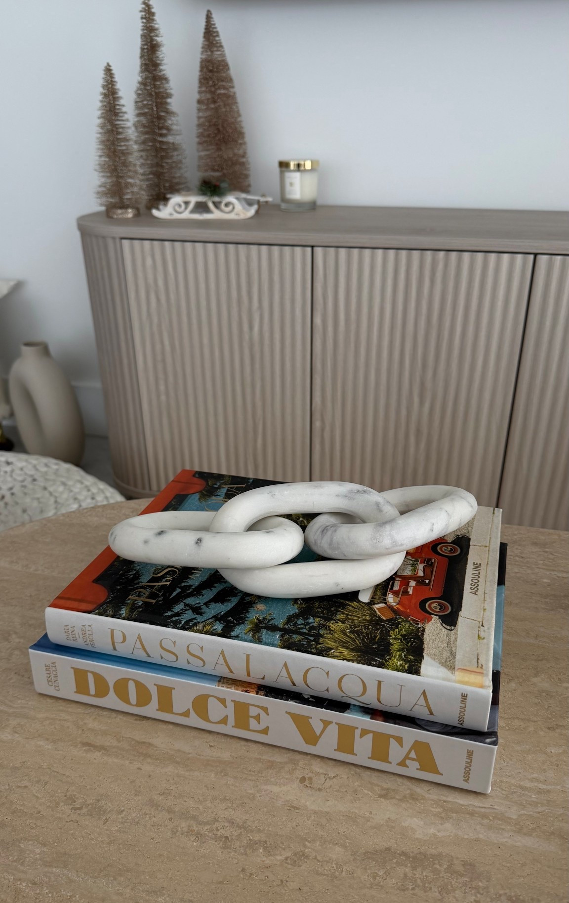Neutral holiday touches + Assouline classics. My favorite corner at home right now.

assouline, coffee table decor, home decor, neutral decor, marble chain, holiday decor, living room styling, interior inspo, modern home, minimal home, decor books, coffee table books, home accents, tabletop styling, chic home decor, neutral home styling, aesthetic home, interior details, luxury decor

#LTKGiftGuide #LTKHome