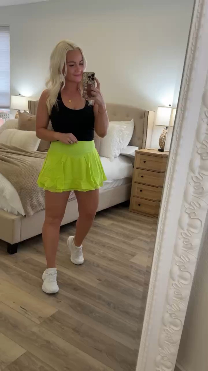 This bright green tennis skirt is so freaking cute! The color is such a fun pop, and the double-tiered ruffle adds the perfect playful touch. It also has built-in shorts, which is a total must for an activewear skirt like this. It’s comfy, flattering, and definitely one of my favorite sporty finds this season.

#TennisSkirt #AmazonFashion #ActivewearStyle #BuiltInShorts #RuffleSkirt #BrightColors #SportyAndCute #AthleisureLook #ComfyAndChic #WardrobeFavorites 

 #LTKActive #LTKFindsUnder50 #LTKStyleTip
