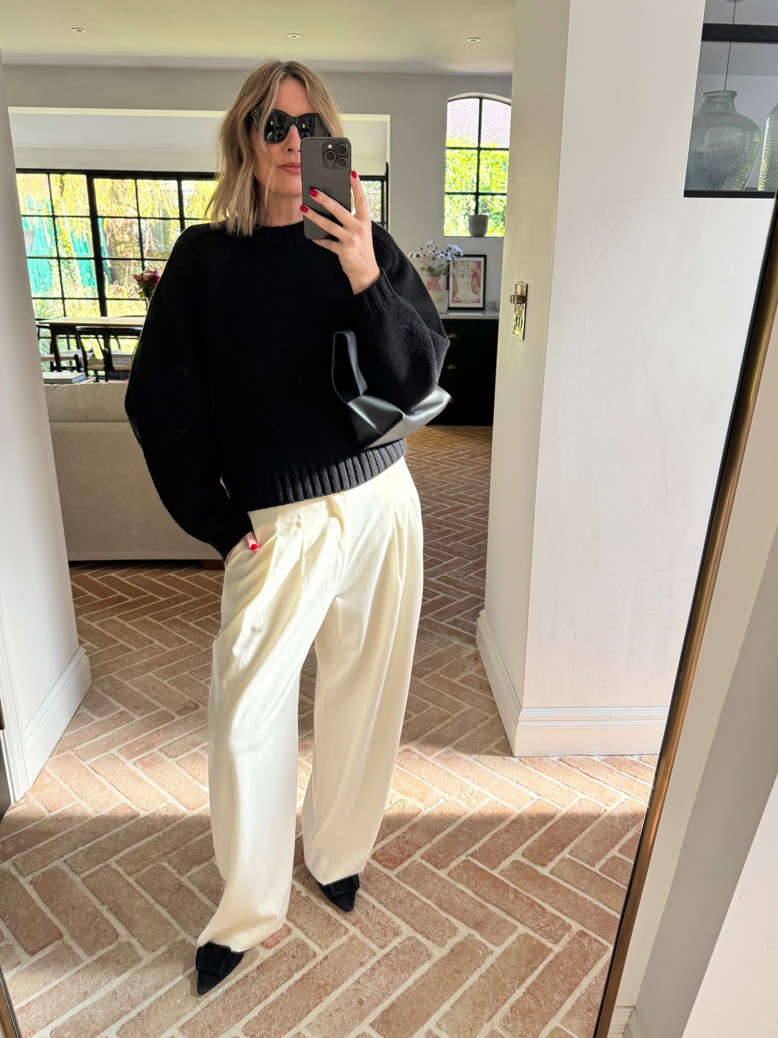Wide leg pants + Crew Neck Jumper + Suede Mules + Leather Clutch | Spring Looks | Net-A-Porter 

 #LTKuk #LTKspring #LTKeurope