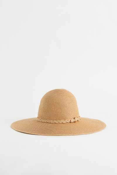 Hat in paper straw. Rounded crown, braided band, and liner band in grosgrain. Width of brim 4 3/4... | H&M (US)