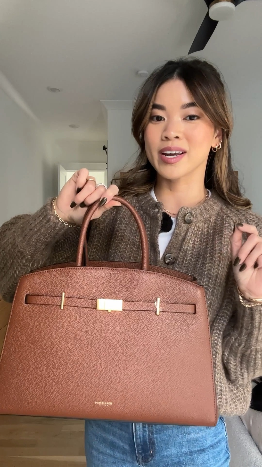 Unboxing my new DeMellier London Midi Hudson bag 🤎 it’s so stunning in person!!!! No regrets for getting this one over the New York bag!! It’s the perfect everyday bag. 

🤎 Get 20% off DeMellier with the code EARLY20 🤎

Sweater:XS Taupe
Jeans: 24 #LTKItBag 

#LTKSeasonal #LTKPetite