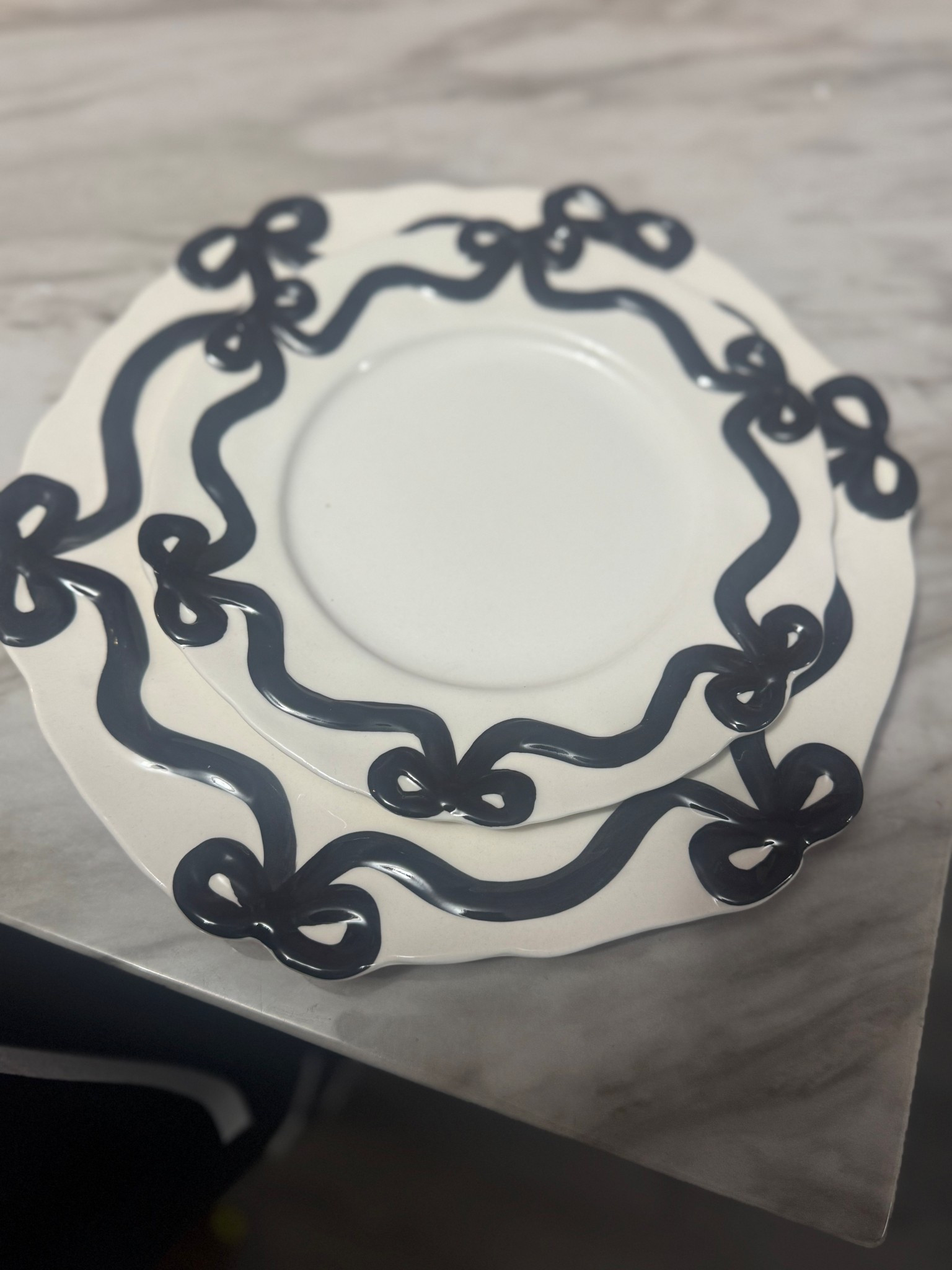 I love bows and black and white so when I saw this dinnerware I knew I had to have it ! 

#LTKHome