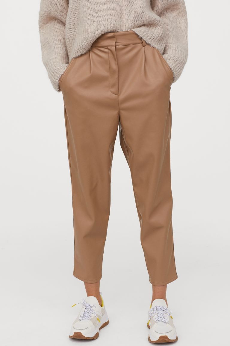 Ankle-length trousers in imitation leather with a high waist, zip fly with a concealed hook-and-e... | H&M (UK, MY, IN, SG, PH, TW, HK)