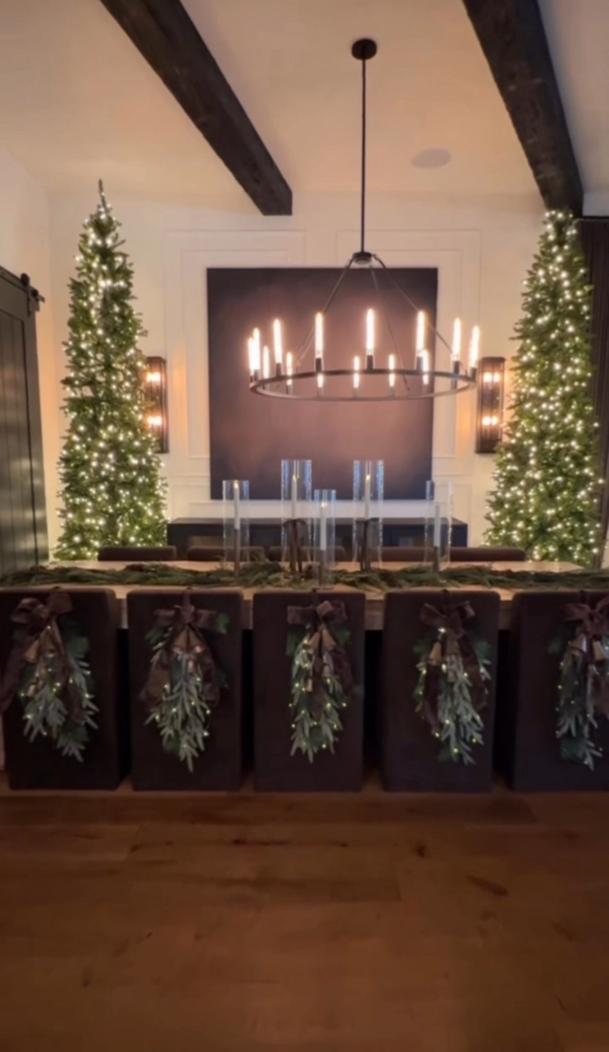 This dining room glow 🤎 Tall lit trees, velvet ribbon wreaths, and layered candlelight create the perfect moody, elegant holiday moment. A cozy blend of modern warmth and timeless Christmas charm.

#neutralholidayhome
#moodyholidaydecor
#modernchristmaslook
#cozyholidayvibes
#elegantchristmasstyle



#LTKHoliday #LTKHome #LTKSeasonal