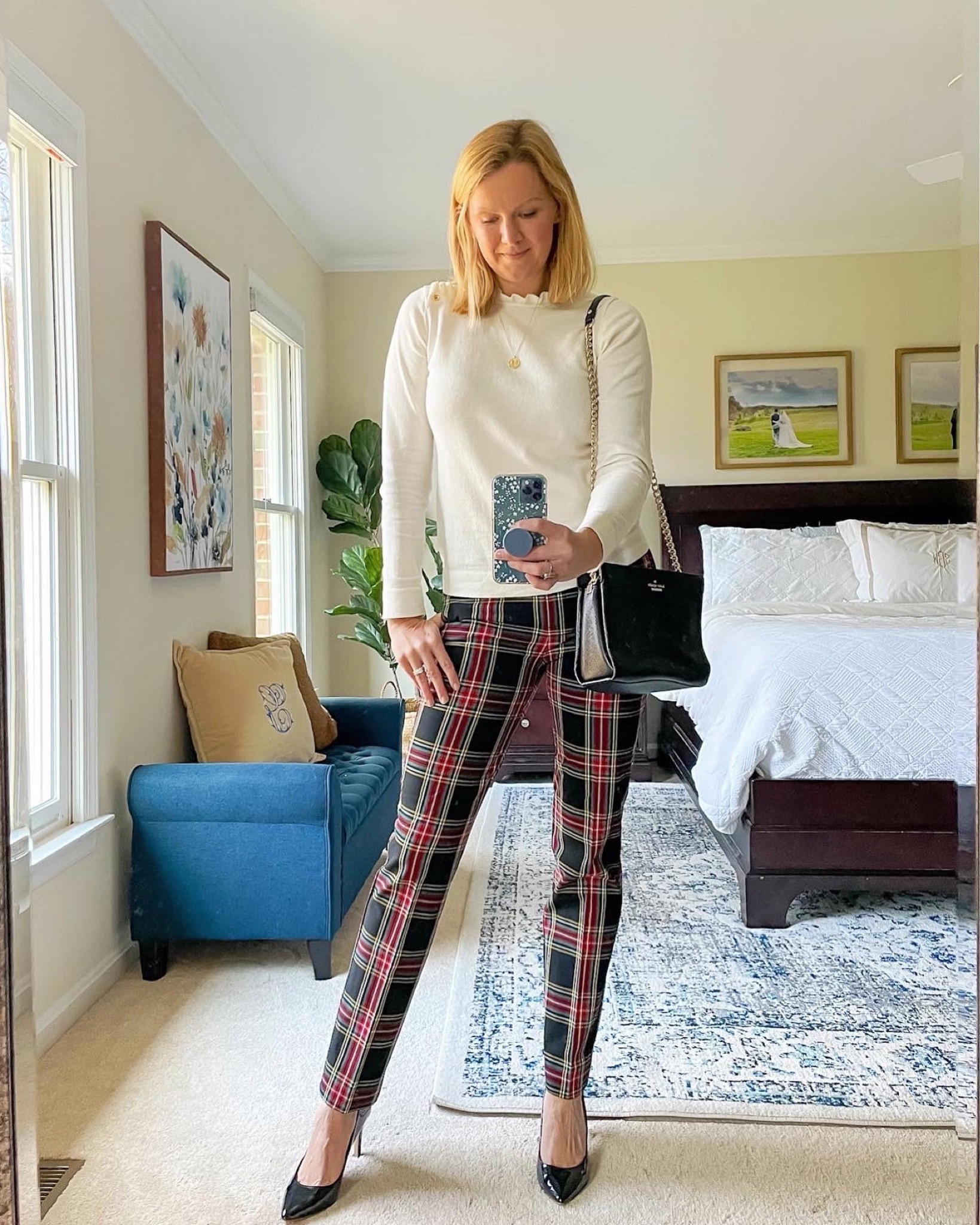 Holiday outfit idea - ruffle neck white sweater with holiday plaid pants and black pumps


#LTKHoliday #LTKSeasonal #LTKfindsunder50