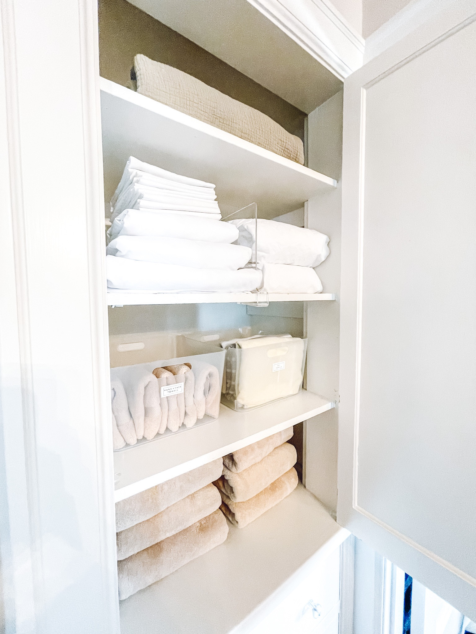 Linen closet organization✨The Home Edit By IDesign Shelf Divider. The Container Store Plastic Storage Bin W/ Handles. Pottery Barn Belgian Flax Linen Sheet Set. Target Becky Cameron Set of 4 Bath Towels. 

#LTKhome #LTKkids #LTKfamily