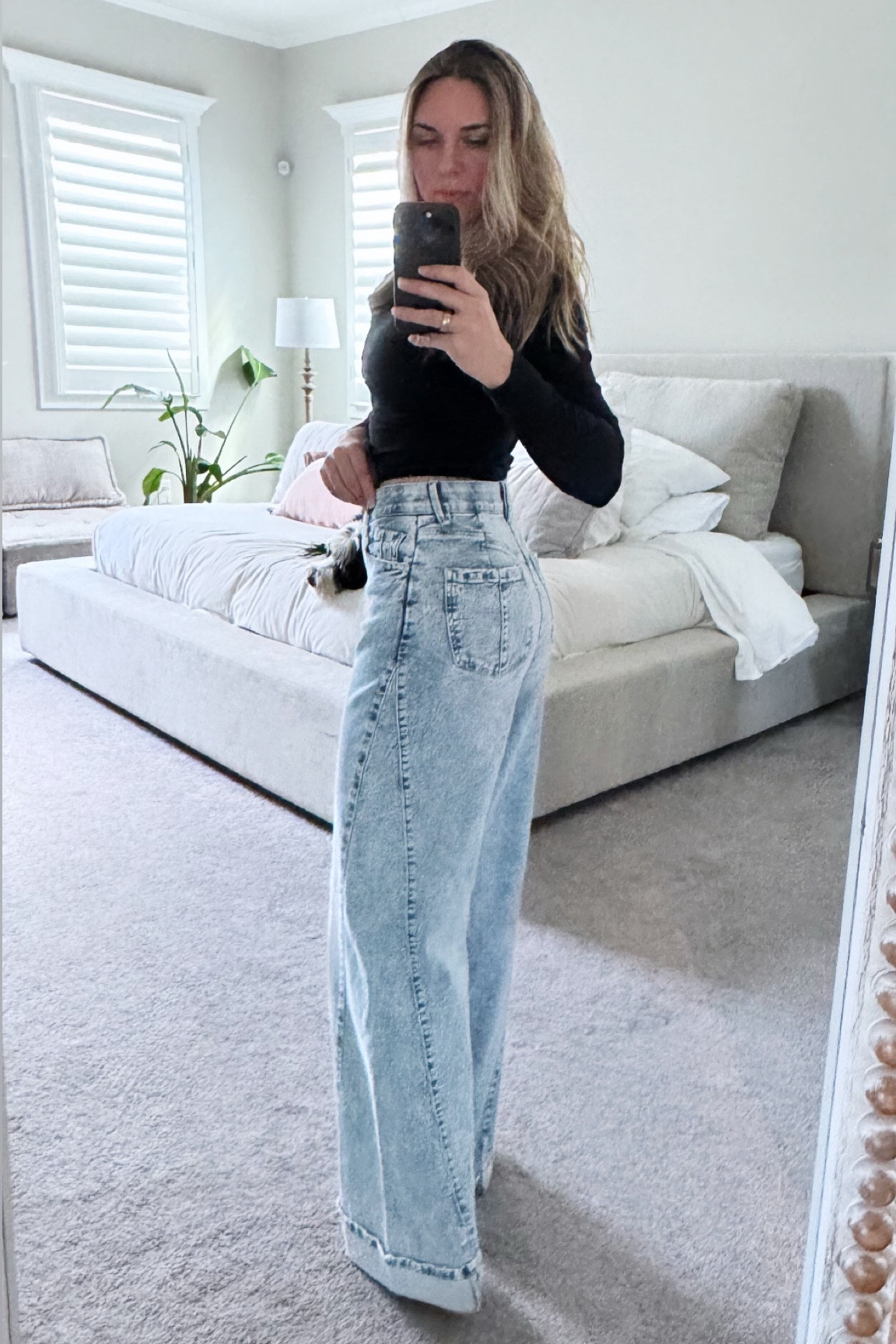Finally found some wide leg denim jeans that are flattering! These have a slimming and supportive  HIGH elastic waistband which I love, they hug the booty, have a folded cuff at the bottom and a fun seam! I’m obsessed with these and they aren’t too pricey either— major win. / true to size, wearing a 4 here #ltkdenim #ltkjeans 

#LTKOver40 #LTKFindsUnder100