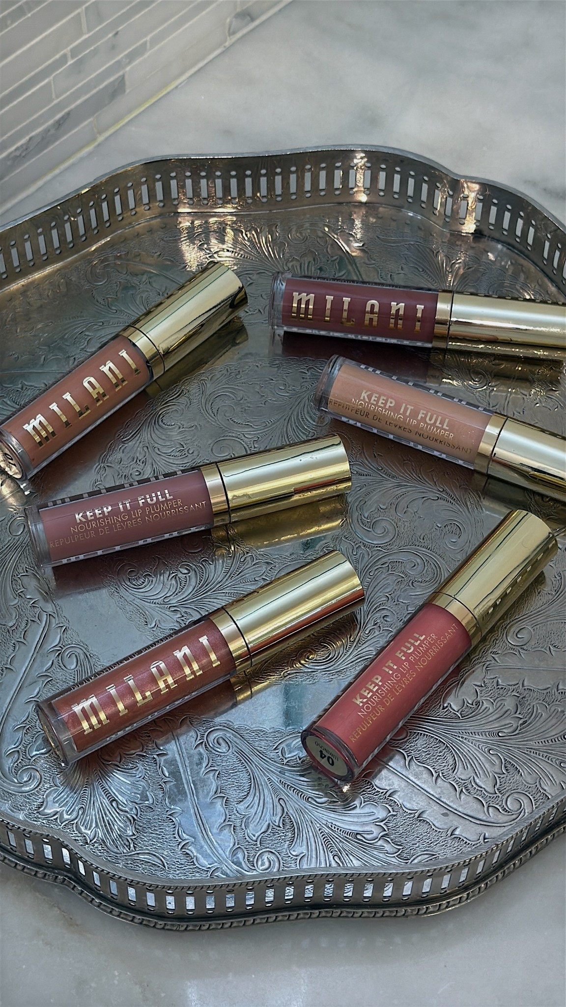 #ad Check out the @milanicosmetics Keep It Full Nourishing Lip Plumpers next time you are at @target ! They are the perfect way to add shimmer, volume and hydration! #target #targetpartner #milanicosmetics #grwmmilani #liketkit @shop.ltk 

#LTKBeauty #LTKFindsUnder100 #LTKSeasonal