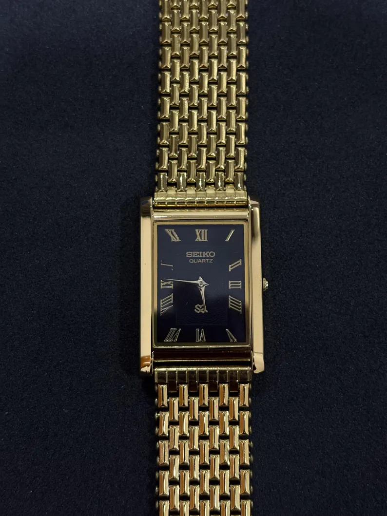 Classic Seiko Slim Tank Watch – Vintage Gold Plated Quartz with Roman Black Dial | Etsy (Global)