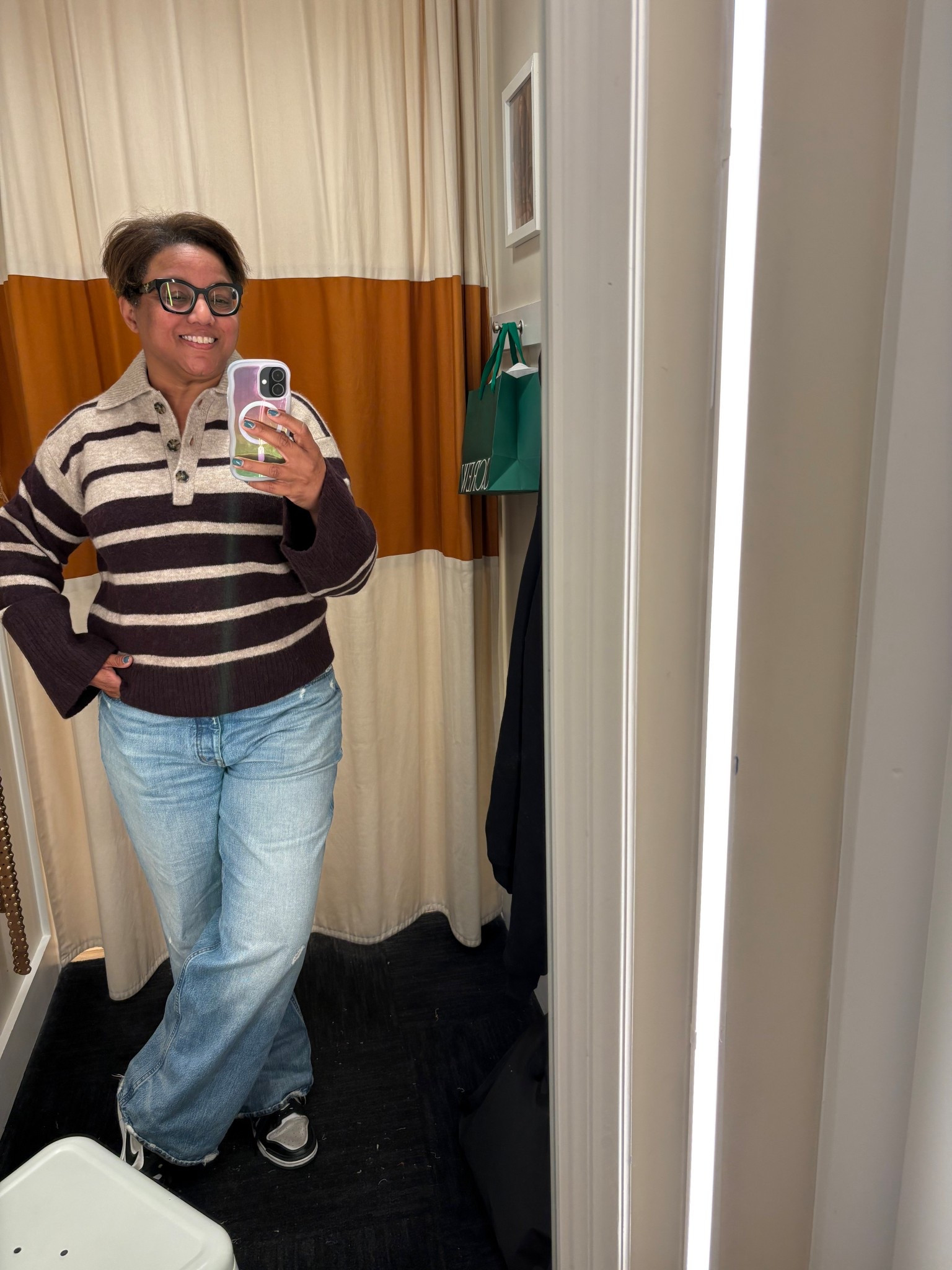 The cuteeeeeest polo sweater!  This beauty is incredibly versatile. Fit is slightly big. I sized down from an XL to a Large  