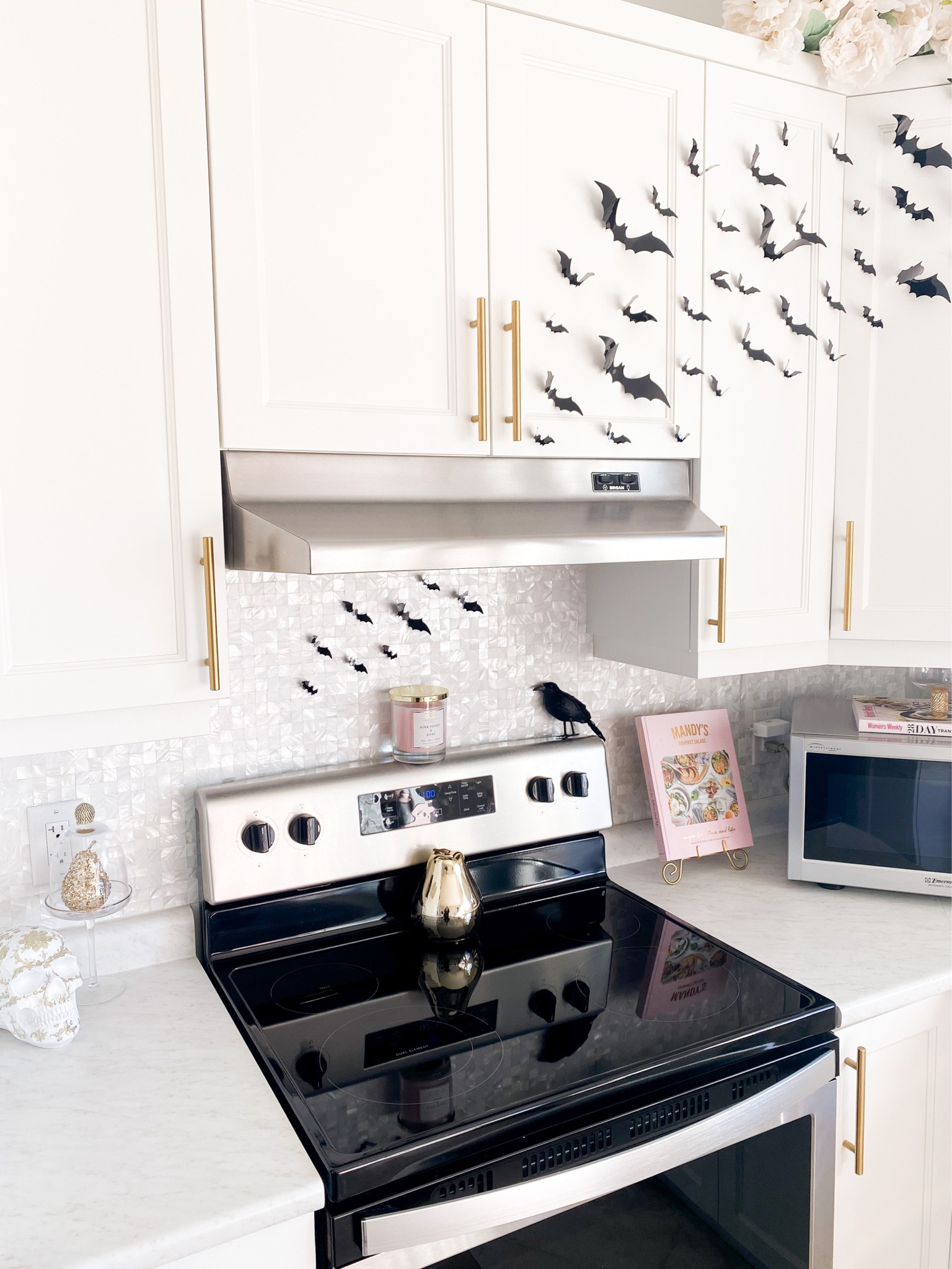 “Look it! It’s freakin’ 𝓫𝓪𝓽𝓼!” 🦇🍽

I rarely post my little kitchen, simply because it’s not done at all and a bit outdated (the microwave is on the freakin’ counter for one, which I personally loathe lol), so I have a lot left to do. However, I couldn’t help myself when these bats arrived! I love the touch of spook it brings to the  kitchen! 

#LTKunder50 #LTKhome #LTKHalloween