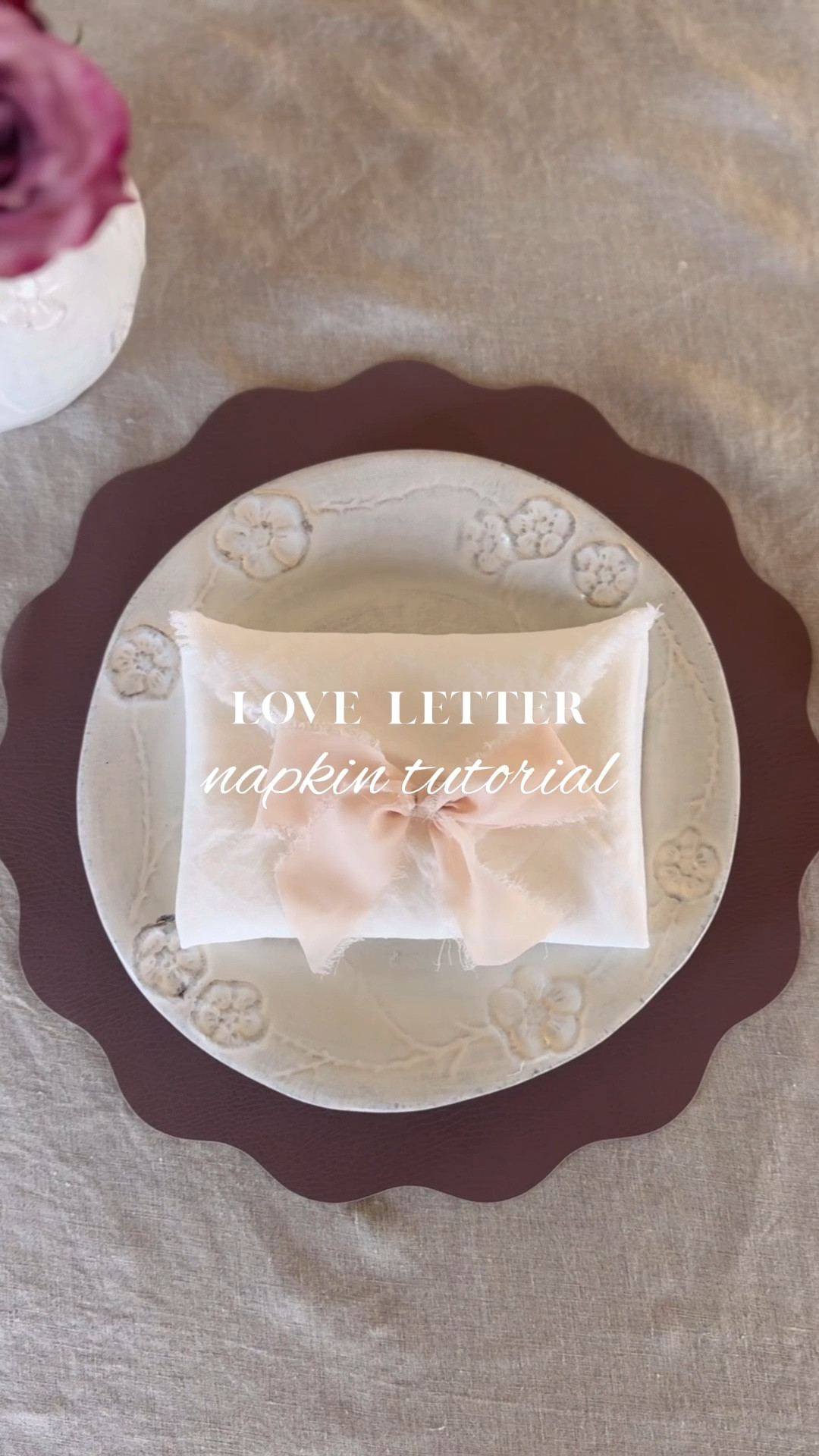 The cutest way to fold napkins for Valentine's Day  💌🎀

Placemat is old from Gathre and dinner plate is old from Anthro (linking similar options for both )