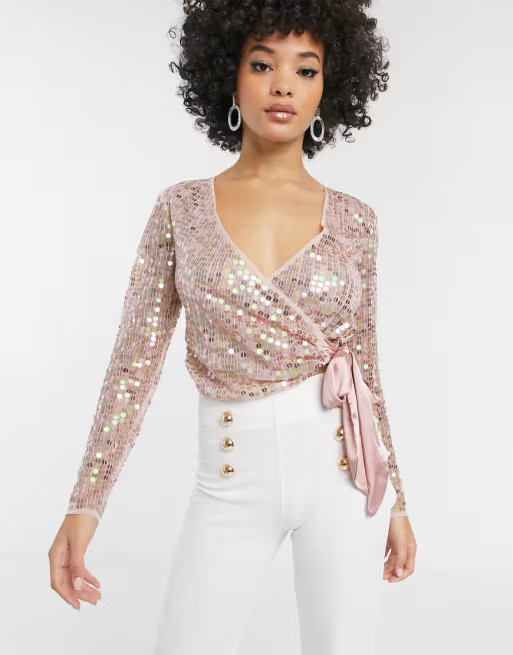 ASOS DESIGN sequin wrap top with bow in pink | ASOS (Global)