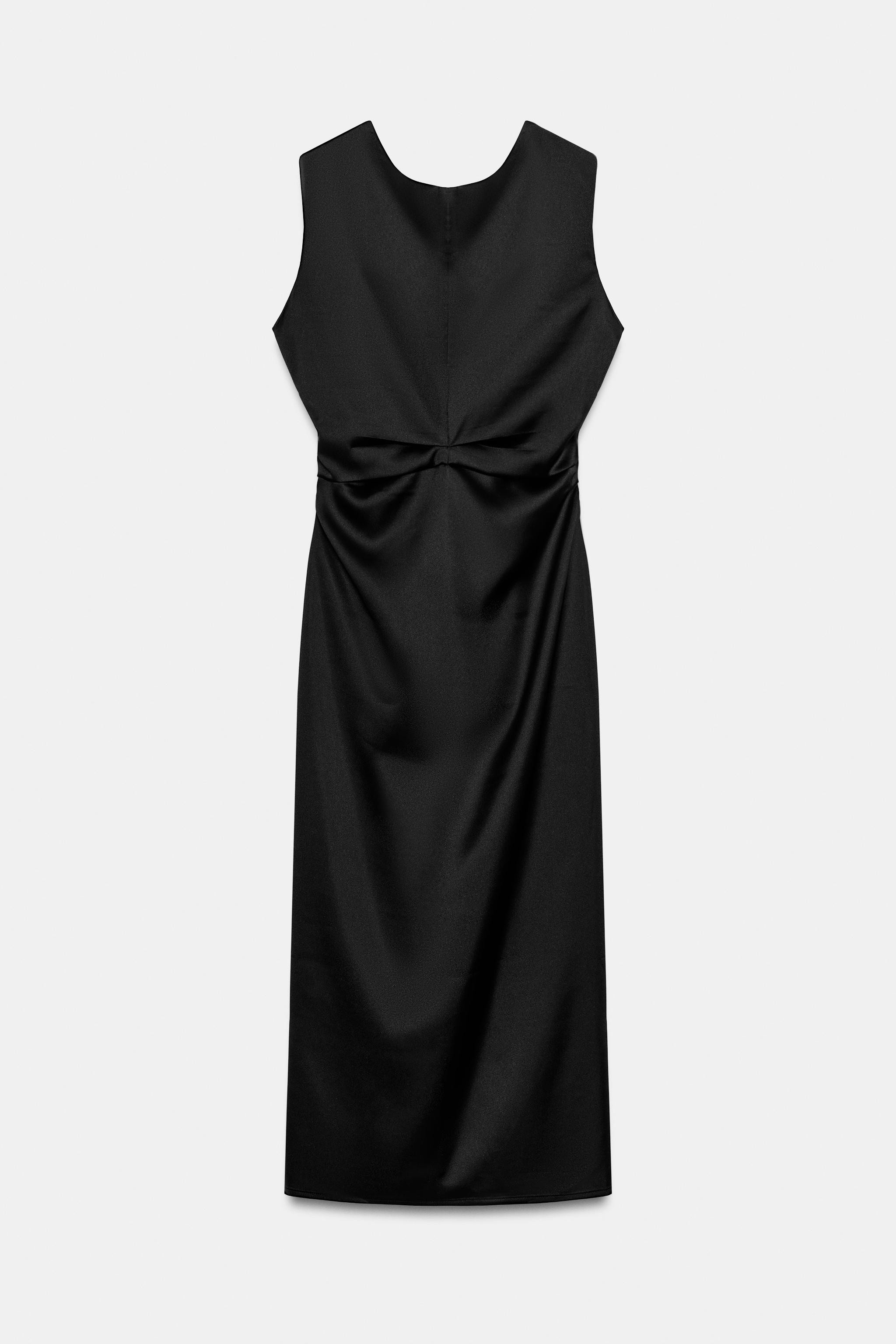 Long dress with a boat neckline and sleeveless design, featuring twisted straps at the back. Ruch... | Zara US