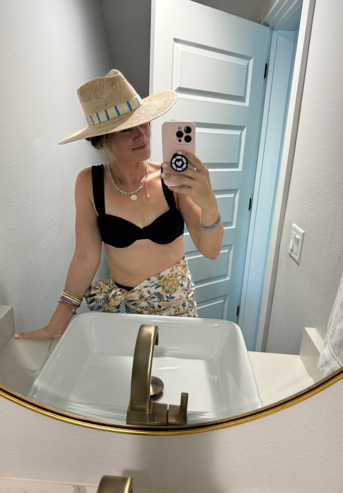 This is my go-to beach hat and it makes every outfit look better!

My sarong is sold out so I linked a few similar 💛

#LTKTravel #LTKootd #LTKSeasonal