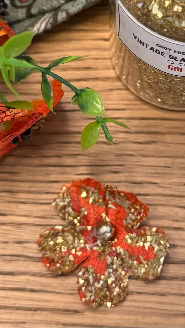 Lots of uses for these. German glass glitter elevates a faux flower 🌺  #giftwrapping #flowers #craft #handmade #glitter

#LTKParties #LTKHome #LTKSeasonal