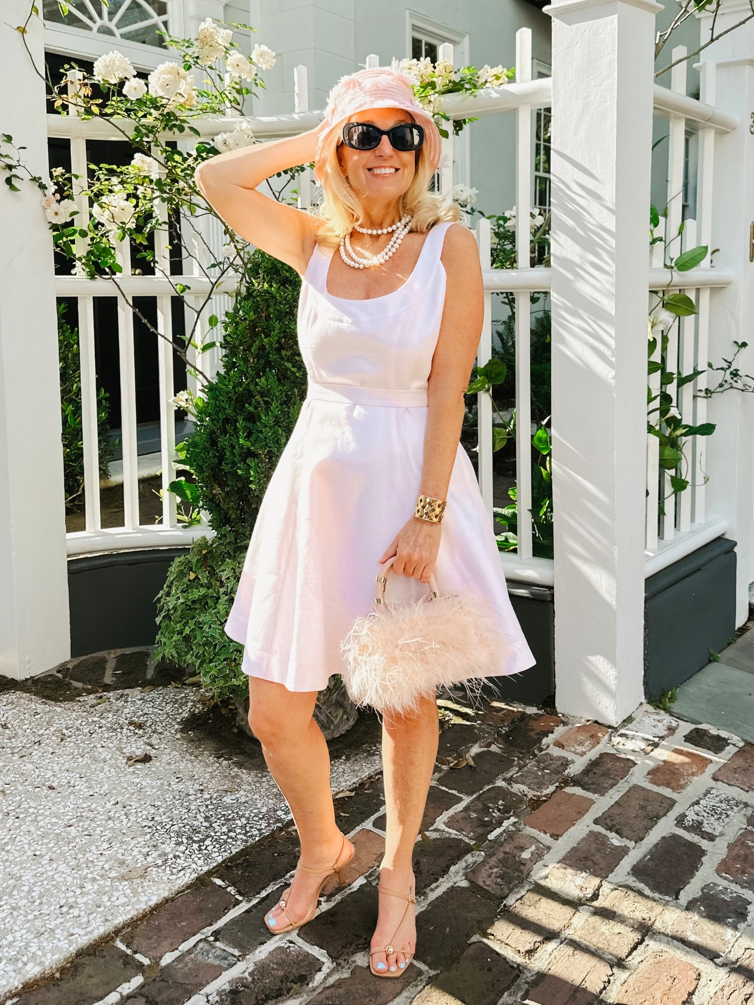 Pretty in pink . . . And a shout out to these shoes which have been the star of my Spring wardrobe - super  versatile and comfortable.  I walked home a mile + in CHS from a brunch and not a problem . . . 
#arebelinprada #pinkdress #hepburnstyle #weddingguestdress #gardenpartydress #pinkdress #kittenheels #springsandals #nudesandals 

#LTKWedding #LTKShoeCrush #LTKParties